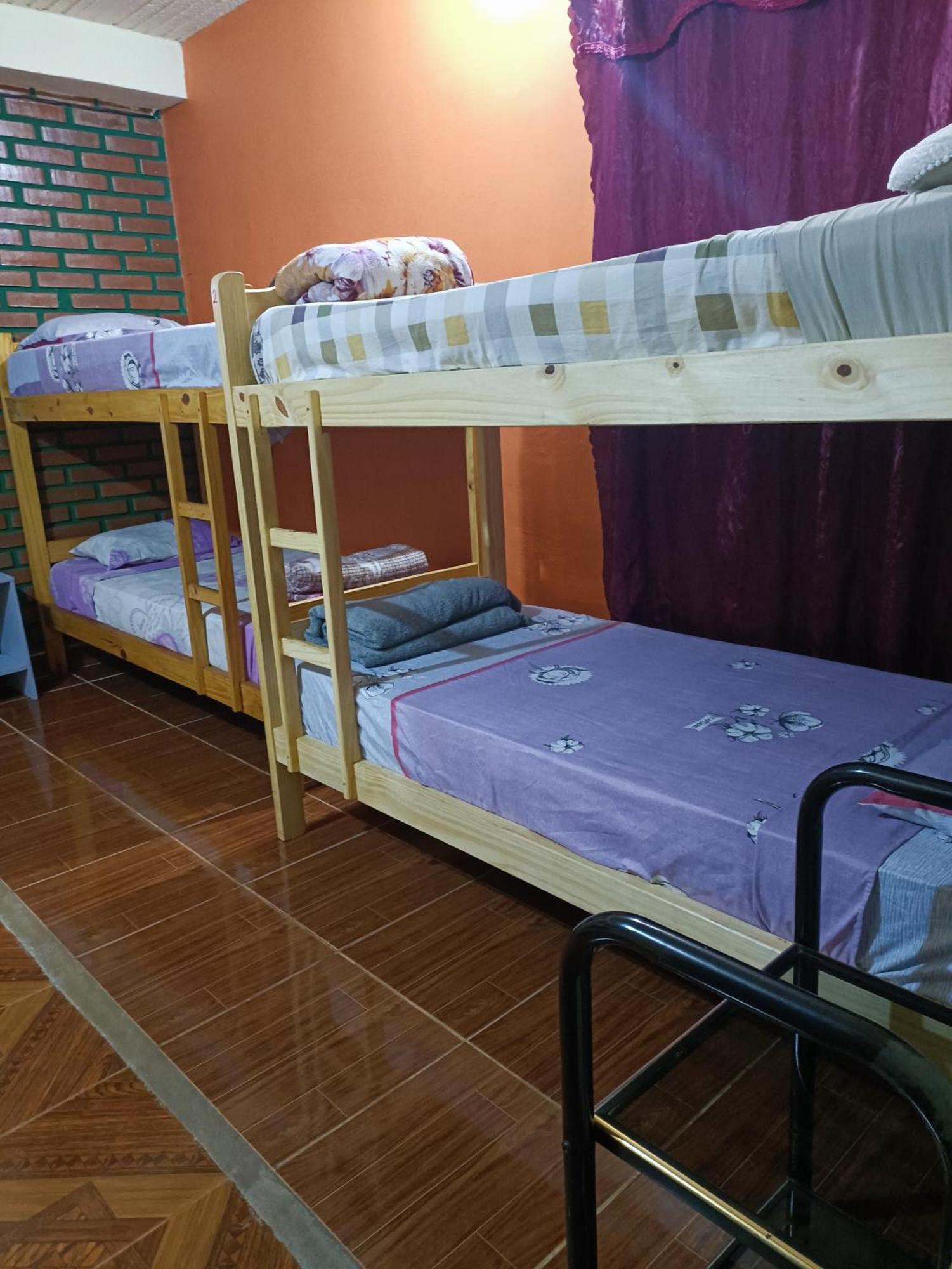 Hostel El Amanecer Пуерто Игуасу Екстериор снимка