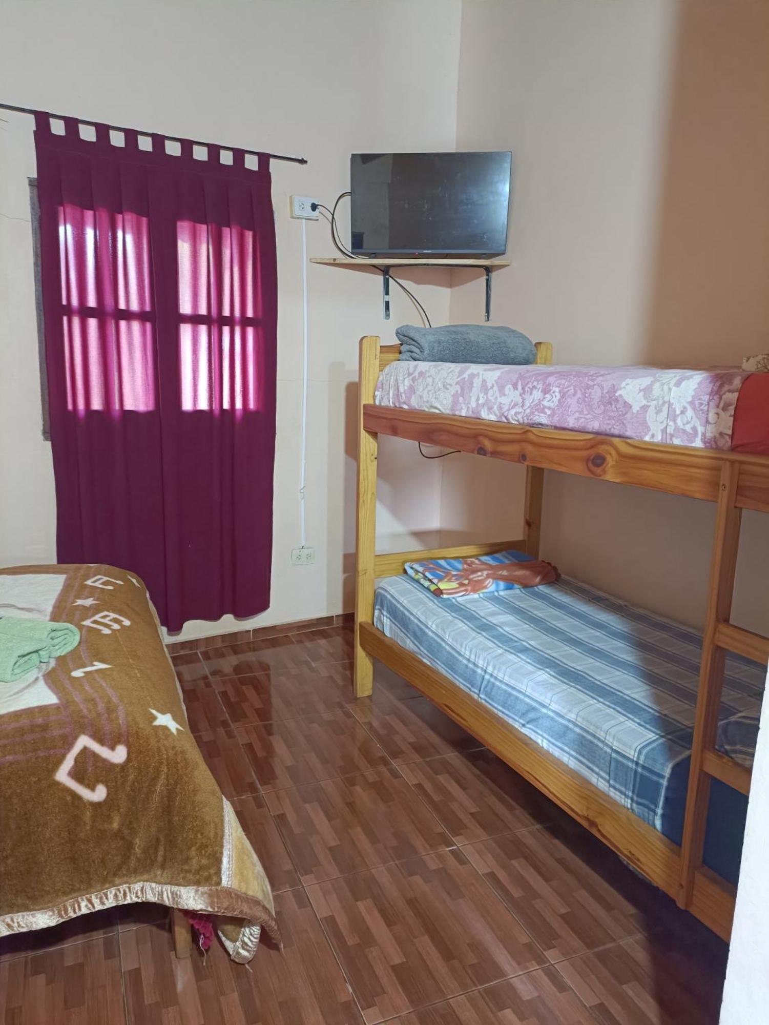 Hostel El Amanecer Пуерто Игуасу Екстериор снимка