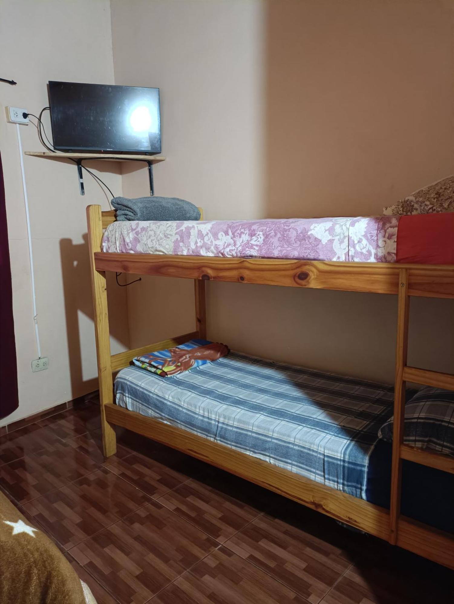 Hostel El Amanecer Пуерто Игуасу Екстериор снимка
